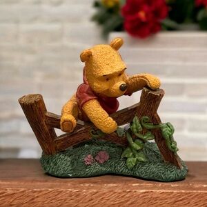 Disney Winnie The Pooh figurine simply Pooh climbing fence